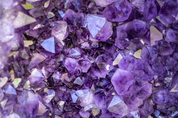 istock Amethyst crystal abstract background overlay 1182561688