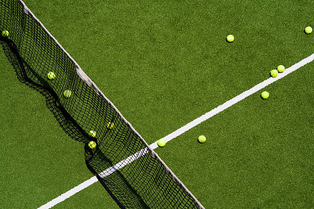 Tennis balls on a field stock photo