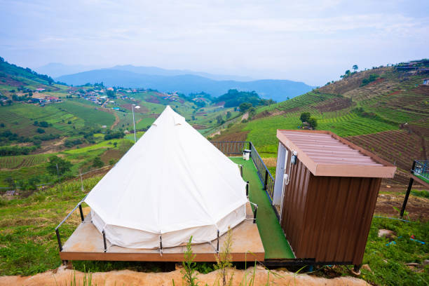 istock canvas tent camping on the mountain 1182565495