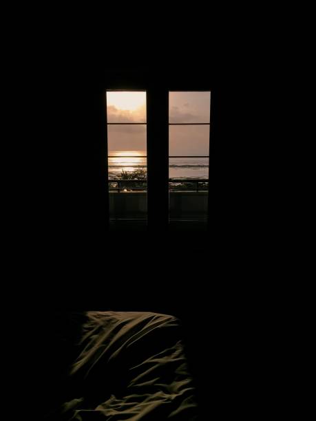istock Window view and sunrise on background 1182566590