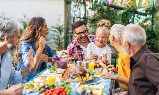 istock Happy family celebrating Thanksgiving day 1182569021
