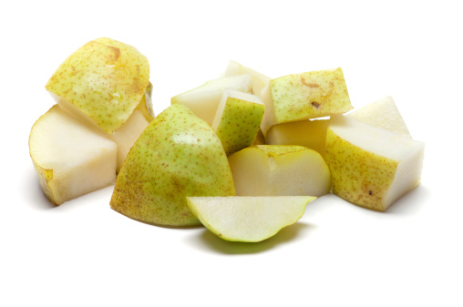 Chunks of pear isolated on white.