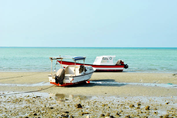 istock Fishermen boats inside the sea 1182571543