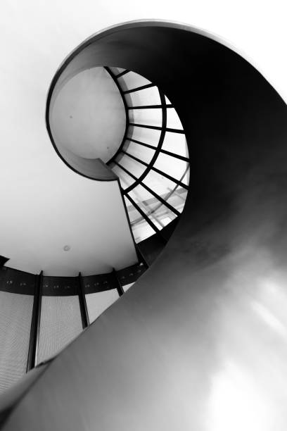 istock black and white color spiral stairs view from bottom 1182573719