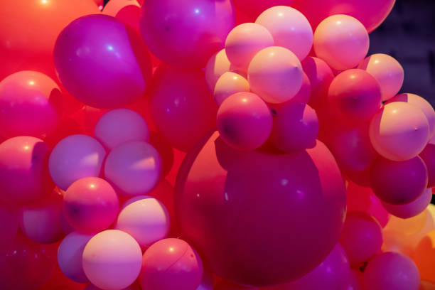istock Pink balloons at social event 1182573913