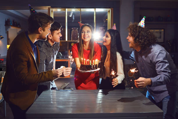 istock Young friends celebrating birthday 1182585402