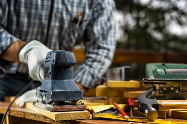 istock Craftsman at work on wooden boards. Carpentry. 1182586019