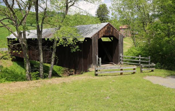istock Locust Creek covered bridge behind fence 1182586335