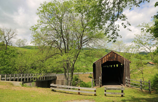 istock Landscape with a front view at Locust Creek covered bridge 1182587080