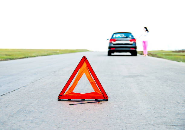Red triangle sign on the road