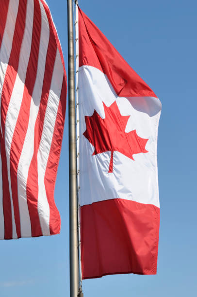 istock Canadian and American Flags 118259496