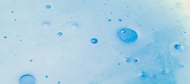 istock Oil bubbles in water, round abstract drops 1182596972