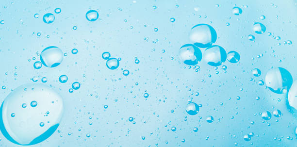istock Oil bubbles in water, round abstract drops 1182597477