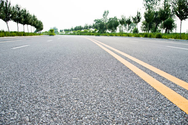 istock Double yellow lines on a road 1182598169