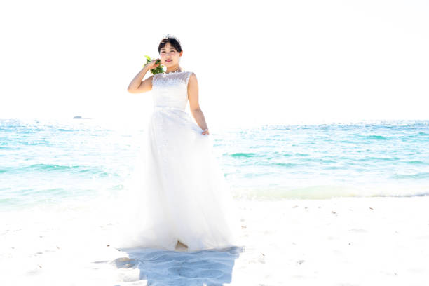 istock Bride in a seaside wedding dress 1182601143