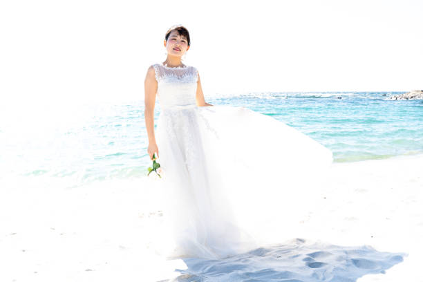 istock Bride in a seaside wedding dress 1182601160