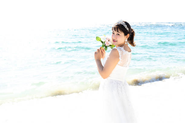 istock Bride in a seaside wedding dress 1182601181