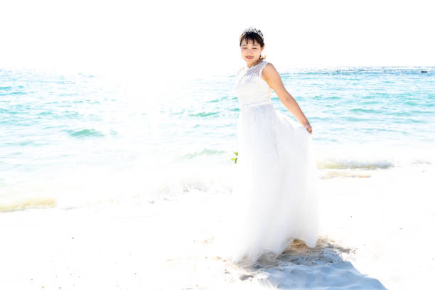 istock Bride in a seaside wedding dress 1182601705