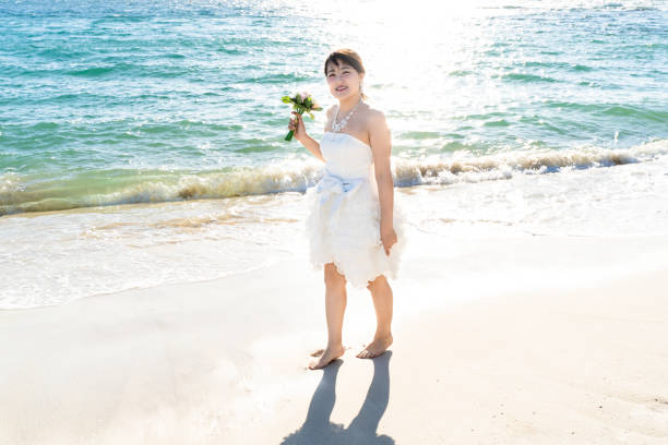 istock Bride in a seaside wedding mini dress 1182601771