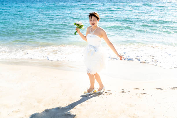 istock Bride in a seaside wedding mini dress 1182601822