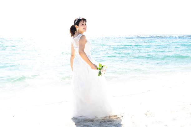 istock Bride in a seaside wedding dress 1182601901