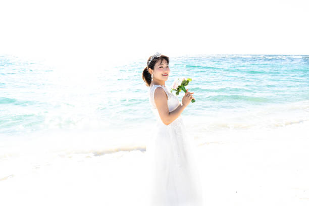 istock Bride in a seaside wedding dress 1182601909