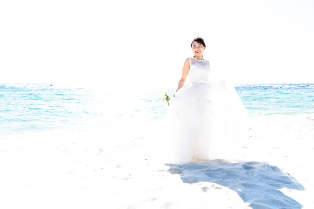 istock Bride in a seaside wedding dress 1182601929