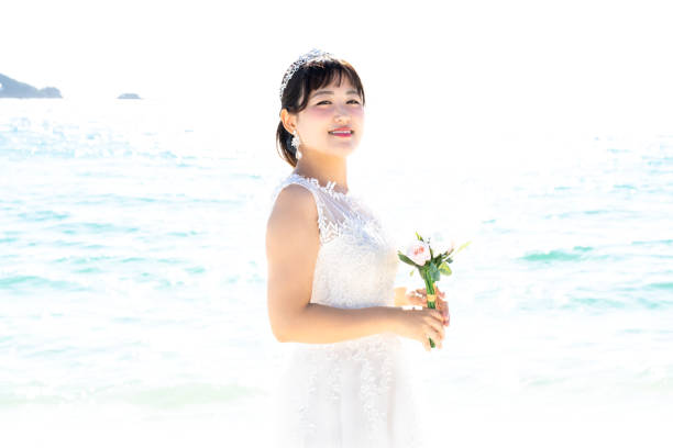 istock Bride in a seaside wedding dress 1182601964