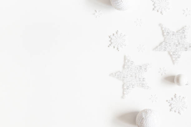 istock Christmas composition. Frame made of white decorations on white background. Christmas, winter, new year concept. Flat lay, top view, copy space 1182603581