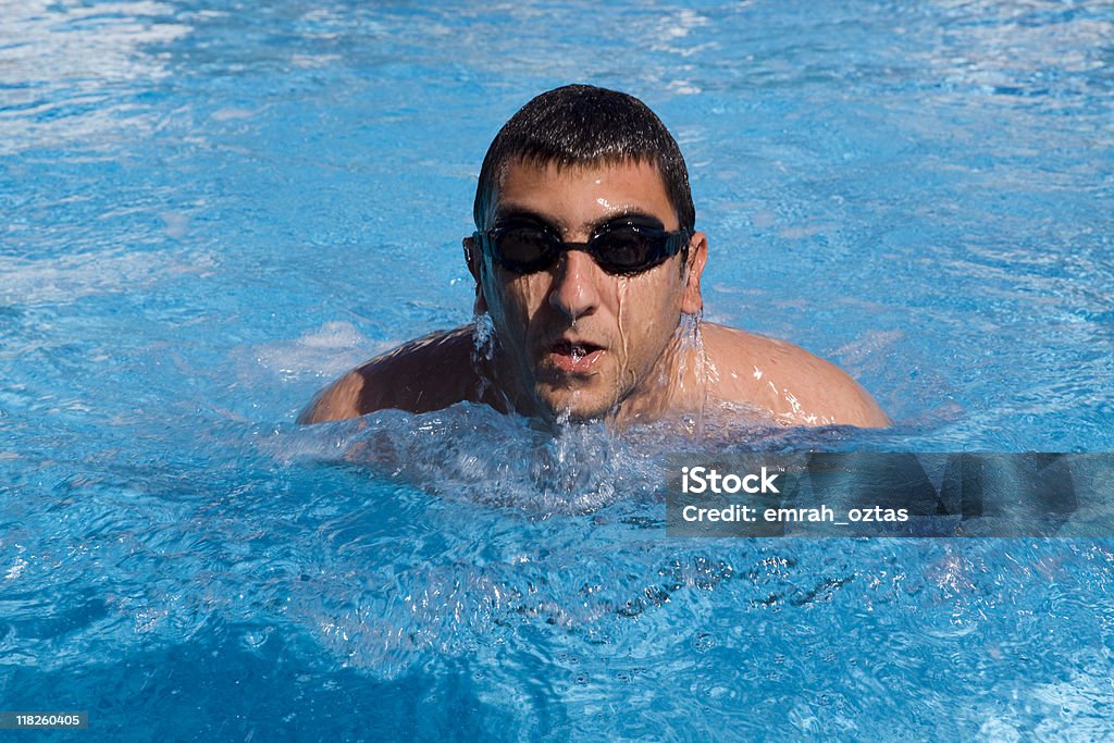 Man swimming in the pool  16-17 Years Stock Photo