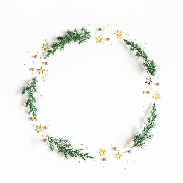 istock Christmas composition. Wreath made of fir tree branches, golden decorations on white background. Christmas, winter, new year concept. Flat lay, top view, copy space 1182604598