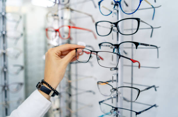 istock Row of glasses at an opticians. 1182605932