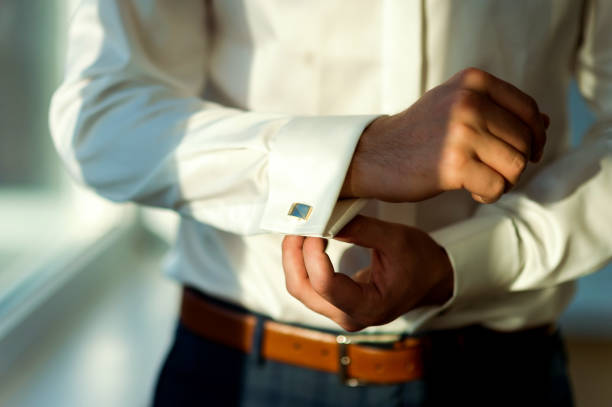 istock Man in white shirt and cufflink. 1182606032