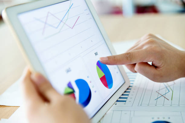 Businesswoman holding a digital tablet working