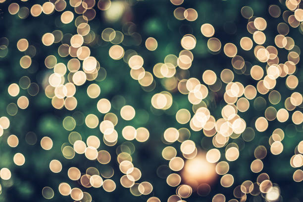 istock Abstract blur decoration ball and light string on christmas tree with bokeh light background.winter holiday seasonal 1182606068