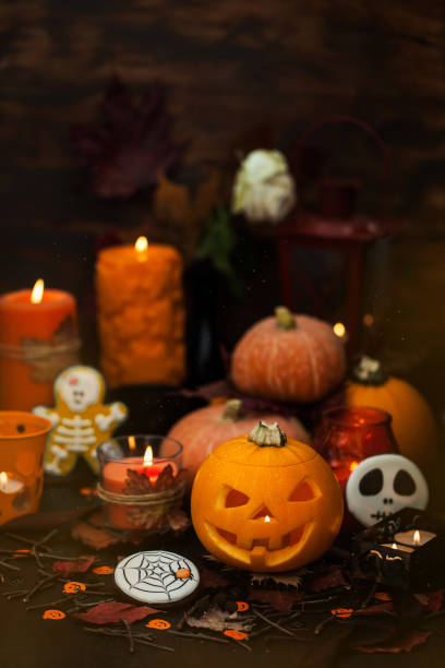 istock Decorative halloween pumpkins and candles 1182607959