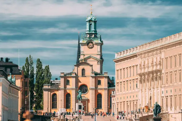 Photo of Stockholm, Sweden. Scenic View Of Stockholm Old Town. Great Church Or Church Of St. Nicholas In Gamla Stan In Summer Day. Famous Popular Destination Scenic Place. UNESCO World Heritage Site