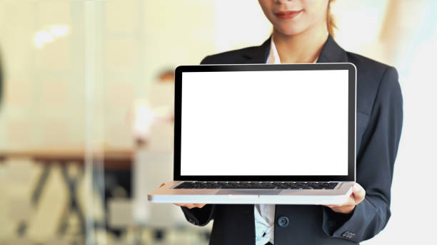 istock Cropped shot businesswoman showing laptop computer with empty screen. 1182608737