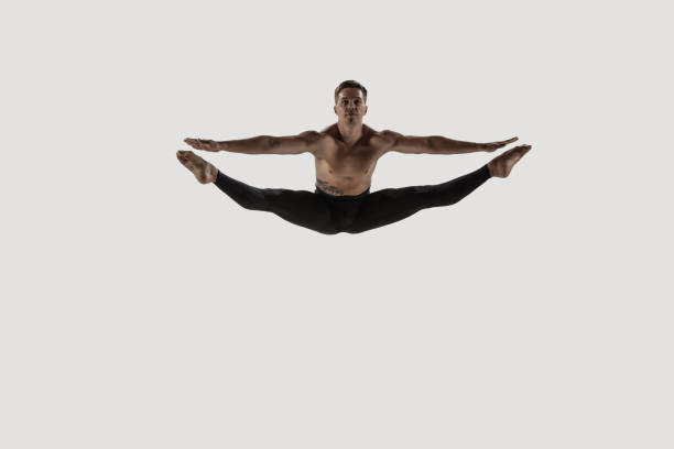 istock Modern ballet dancer. Contemporary art ballet. Young flexible athletic man. 1182608805