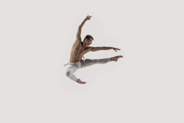 istock Modern ballet dancer. Contemporary art ballet. Young flexible athletic man. 1182608969