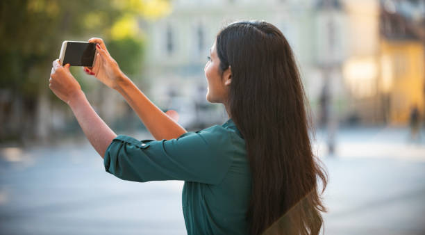 istock Office worker taking selfie in Ljubljana 1182610311