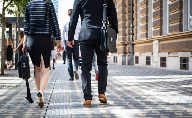 istock Business people walking to the office 1182610329