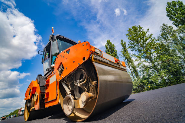 istock Road repair, compactor lays asphalt. 1182611467