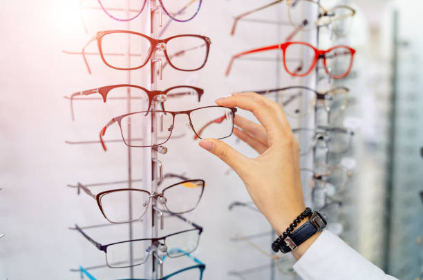 istock Row of glasses at an opticians. 1182611513