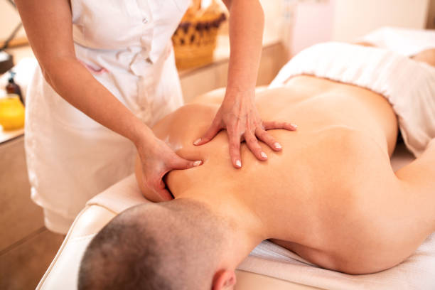 istock Muscular man having a massage 1182613013