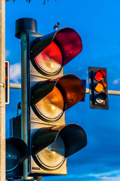 istock Traffic lights over urban intersection 1182613561