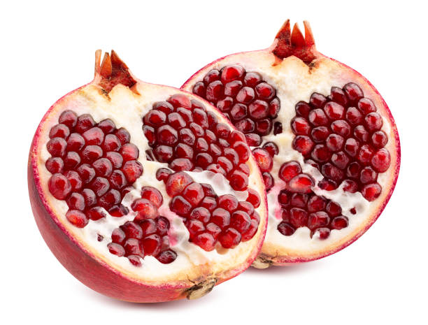istock halves of pomegranate isolated on a white background 1182614300