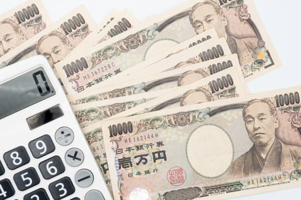 日本貨幣日元貨幣鈔票特寫計算機。 - 摄影 圖片 個照片及圖片檔