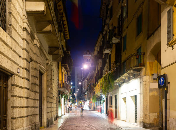 istock Illuminated Verona streets in night 1182615971