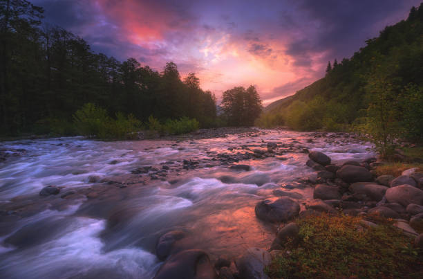 istock sunrise over fast mountain river 1182616161